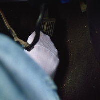 driving in my white sheer socked feet